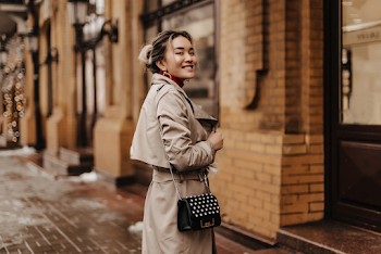 Woman wearing a trench-coat