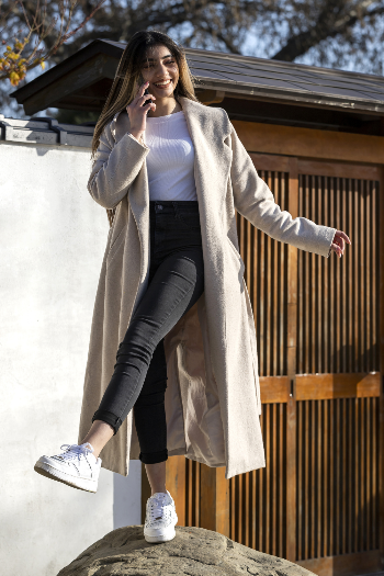 Woman wearing a trench-coat
