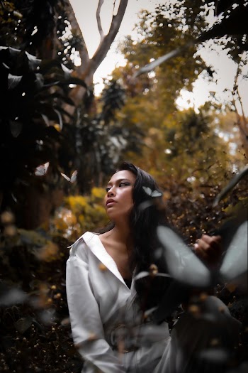 Woman Wearing A White Jumpsuit