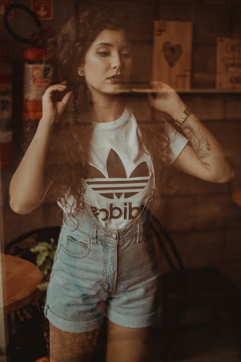 Woman Wearing Adidas T-shirt