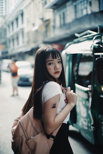 Woman Wearing Backpack