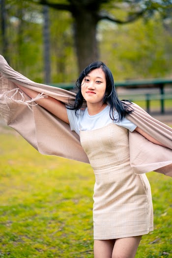 Woman Wearing Beige Dress And Shawl At The Park