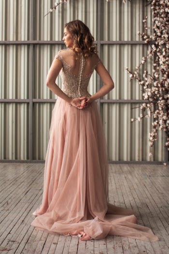 Woman Wearing Beige Gown