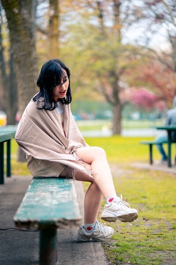 Woman Wearing Beige Scarf