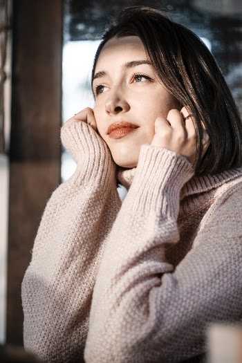 Woman Wearing Beige Sweater