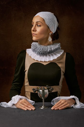 Woman Wearing Black And Brown Long Sleeved Shirt