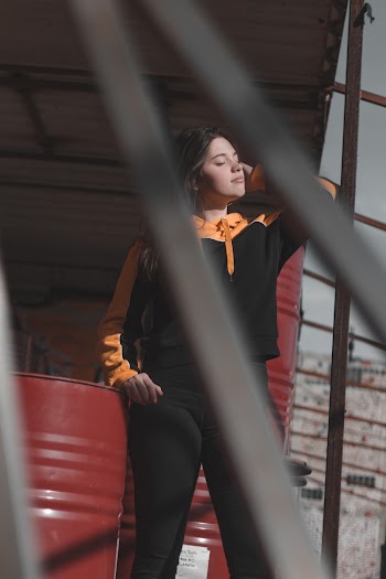 Woman Wearing Black and Orange Jacket