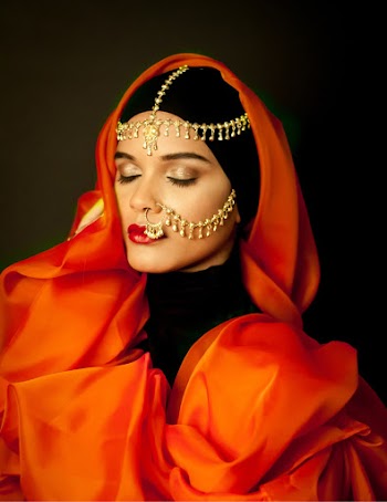 Woman Wearing Black and Orange Top