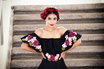 Woman Wearing Black And Pink Floral Blouse