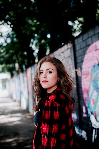 Woman Wearing Black and Red Checkerd Jacket