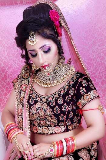 Woman Wearing Black and Red Floral Sari Dress