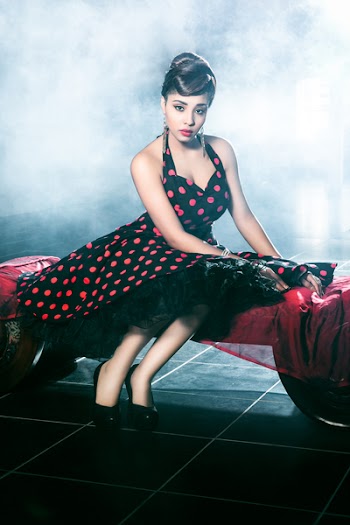 Woman Wearing Black and Red Polka-dot Dress
