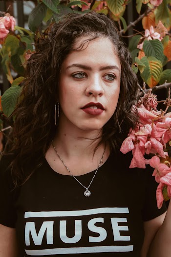 Woman Wearing Black and White Crew-neck Shirt