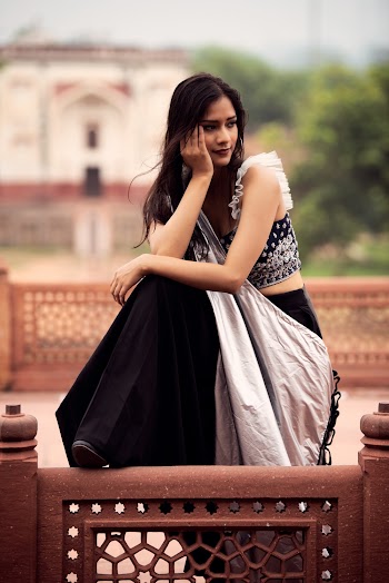 Woman Wearing Black and White Dress