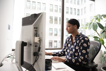 Woman Wearing Black and White Floral Dress Shirt