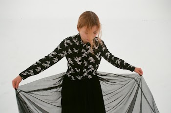 Woman Wearing Black and White Floral Long-sleeved Shirt