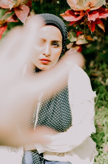 Woman Wearing Black and White Hijab Headdress