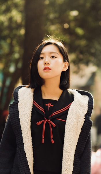 Woman Wearing Black And White Jacket