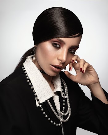 Woman Wearing Black and White Long-sleeved Collared Dress
