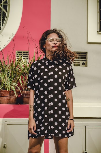 Woman Wearing Black And White Polkadot Short Sleeve Dress