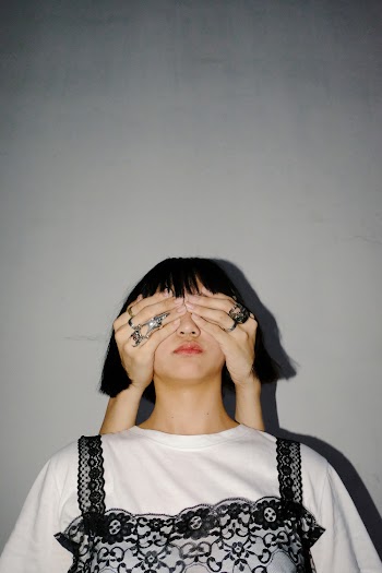 Woman Wearing Black and White Shirt