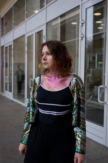 Woman Wearing Black and White Spaghetti Strap Dress Standing Near Building