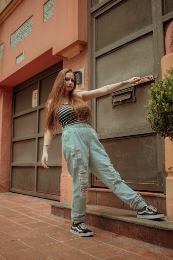 Woman Wearing Black and White Striped Top