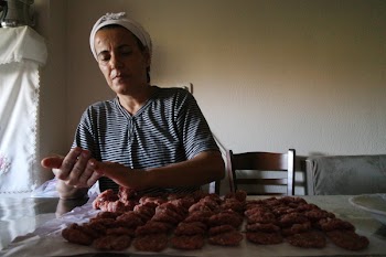 Woman Wearing Black and White Striped Top Preparing Food