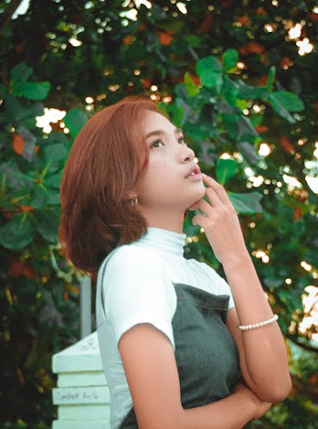 Woman Wearing Black and White Turtleneck Shirt