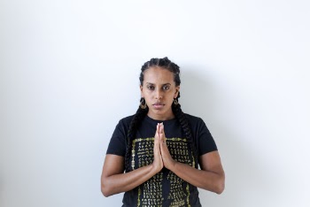 Woman Wearing Black and Yellow Crew-neck T-shirt Praying