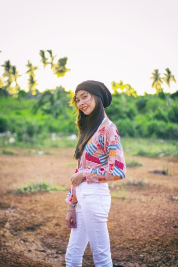 Woman Wearing Black Beanie Standing on Brown Soil Field