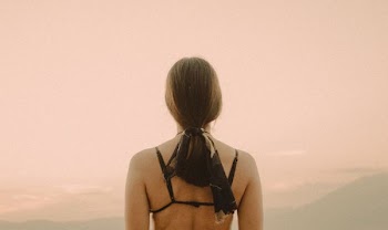 woman wearing black bra at daytime