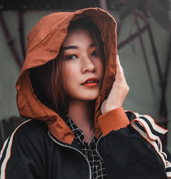 Woman Wearing Black, Brown, and White Hooded Jacket