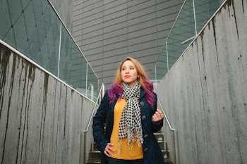 woman wearing black button-up coat