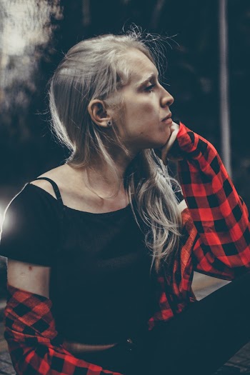 Woman Wearing Black Cap-sleeved Blouse