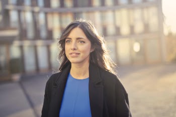 Woman Wearing Black Coat Standing