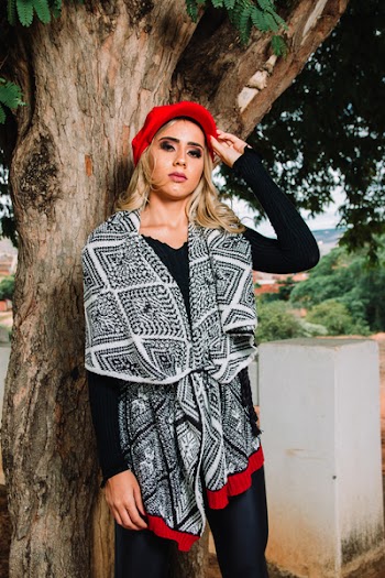 Woman Wearing Black Crew-neck Long-sleeved Top Standing Beside Tree