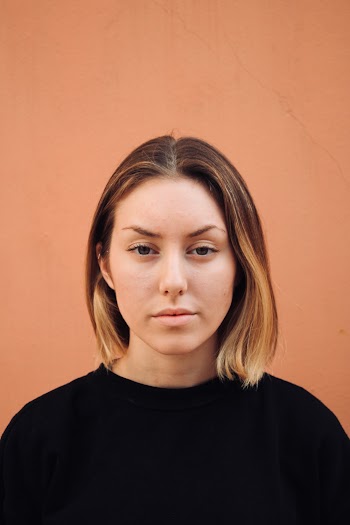Woman Wearing Black Crew-neck Shirt