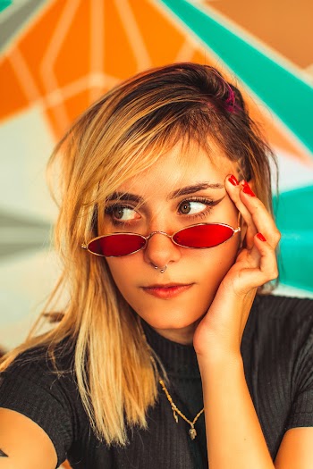 Woman Wearing Black Crew-neck Shirt and Sunglasses