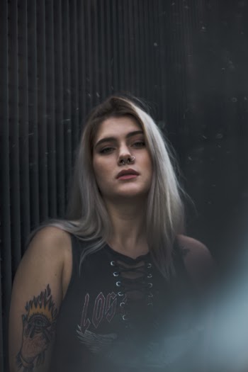 Woman Wearing Black Crew-neck Top