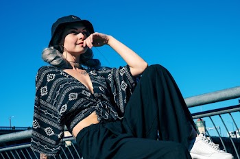 Woman Wearing Black Crop Top And Black Pants