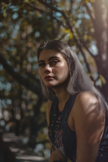 Woman Wearing Black Floral Sleeveless Top