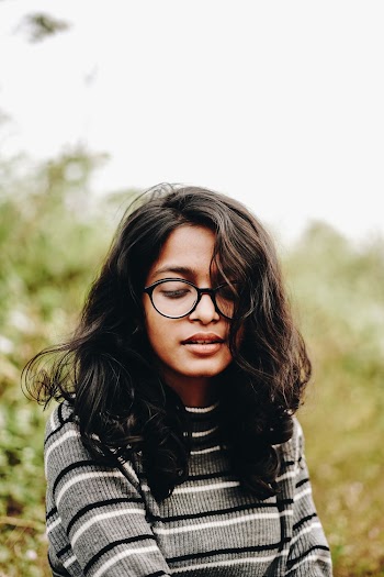 Woman Wearing Black Frame Eyeglasses