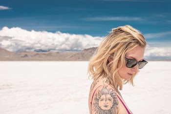 woman wearing black frame sunglasses
