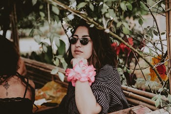 Woman Wearing Black Frame Sunglasses