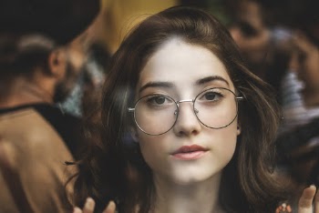 Woman Wearing Black- Framed Eyeglasses