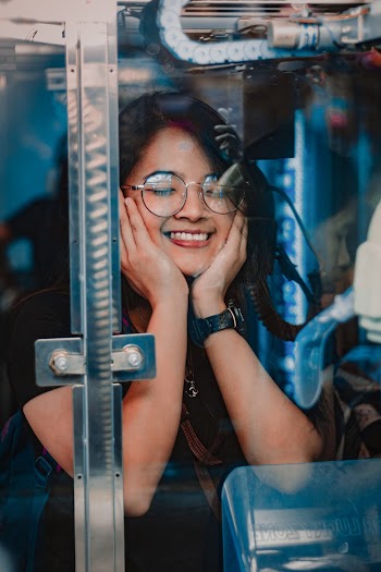 Woman Wearing Black-Framed Eyeglasses
