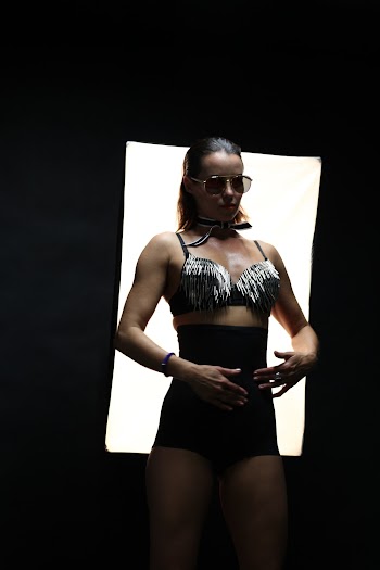 Woman Wearing Black Fringe Top