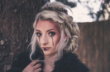 Woman Wearing Black Fur Top