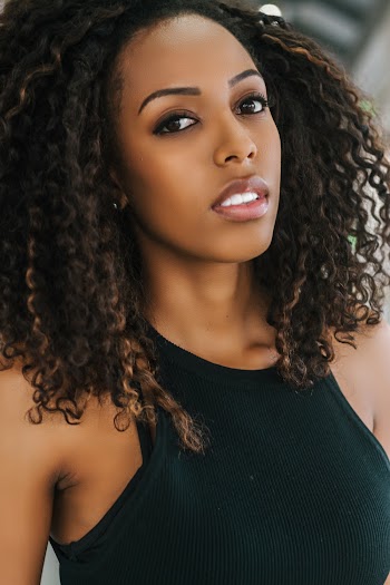 Woman Wearing Black Halter-strap Top